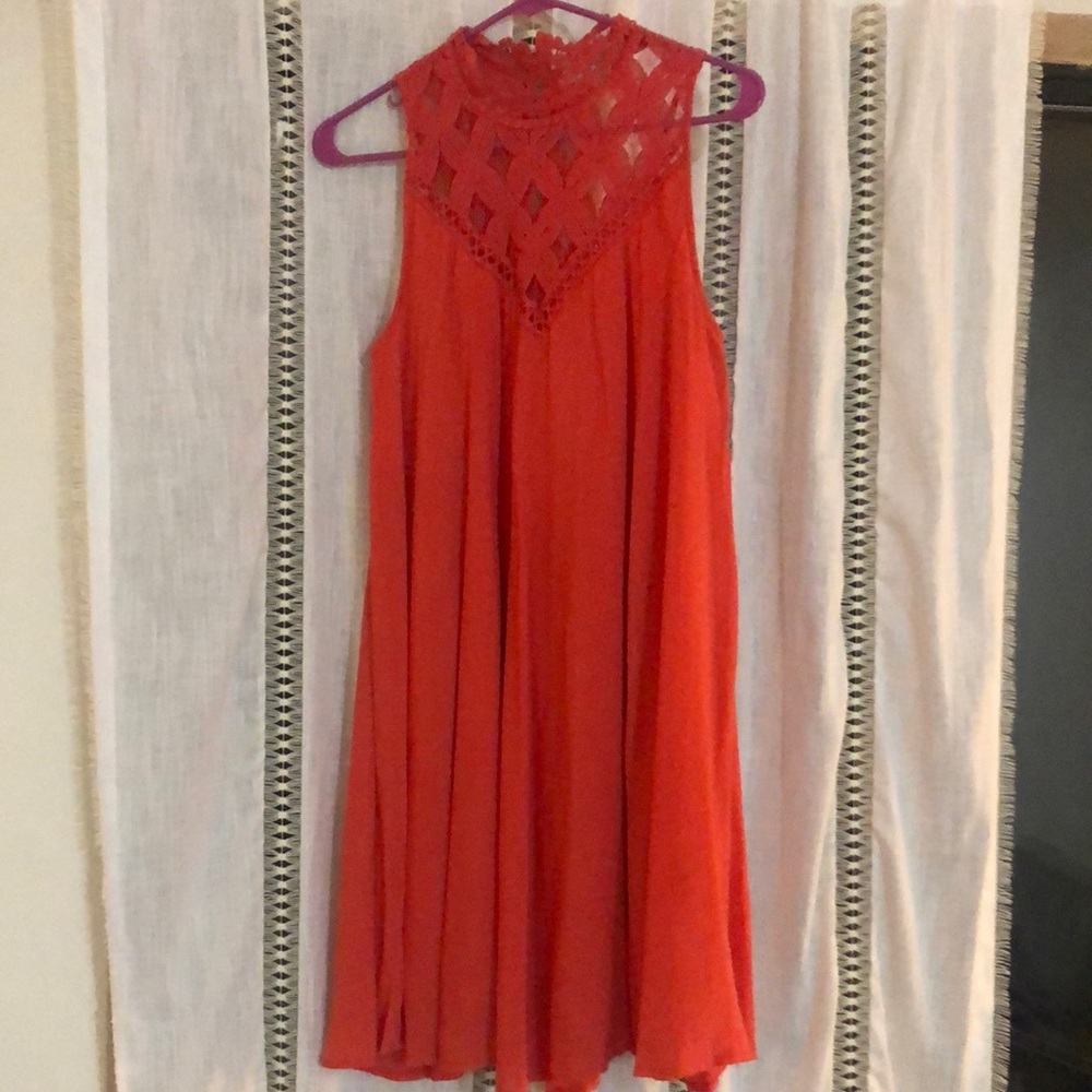 Orange/coral dress with lace detail at the top